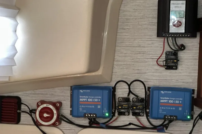 Slide: The Image of Electrical setup on a 1991 Catalina 42 yacht with solar charge controllers. - 70