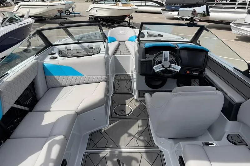 Slide: The Image of 2024 Tigé Z1 boat interior with modern seating and sleek dashboard design. - 10