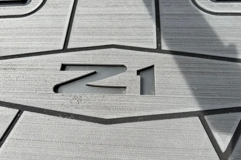 Slide: The Image of 2024 Tigé Z1 boat floor with embossed design and shadow. - 11