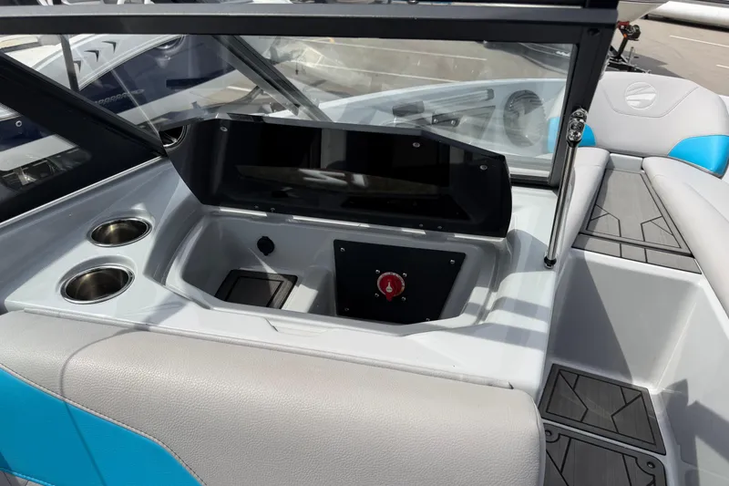 Slide: The Image of 2024 Tigé Z1 boat interior with cup holders and control panel. - 12