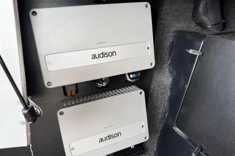 Slide: The Image of Audio amplifiers installed in a 2024 Tigé Z1 boat, featuring Audison components. - 13