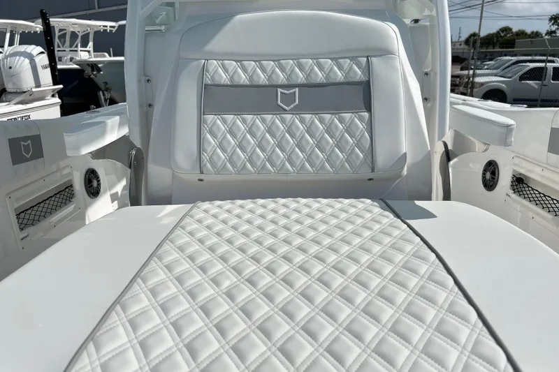 Slide: The Image of Luxurious seating on 2026 Sea Fox 268 Commander boat with diamond-stitched upholstery. - 15