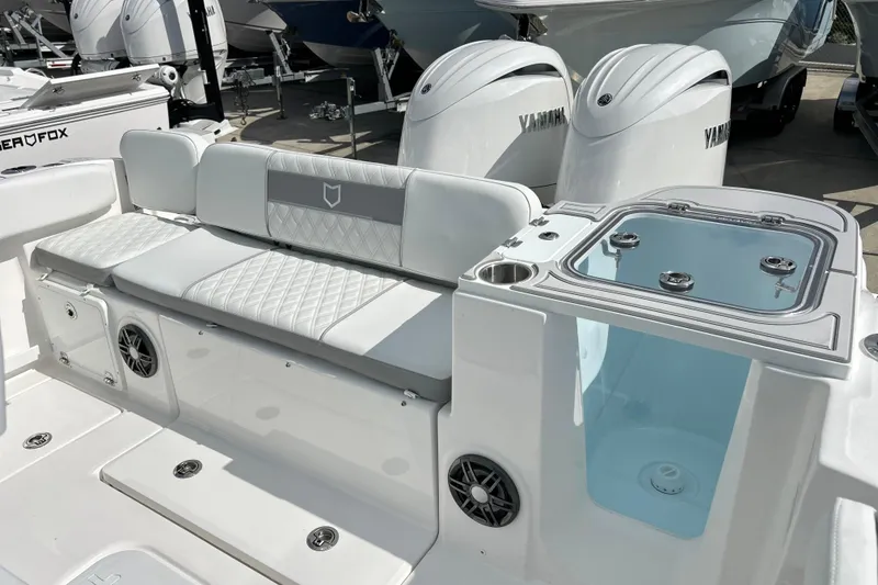 Slide: The Image of 2026 Sea Fox 268 Commander boat interior with seating and Yamaha engines. - 17