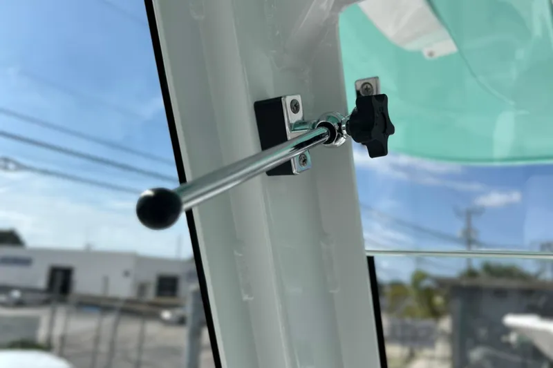 Slide: The Image of Close-up of a 2026 Sea Fox 268 Commander boat's window latch mechanism. - 22
