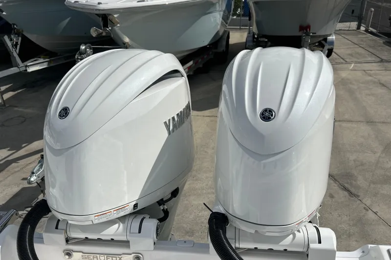 Slide: The Image of Twin Yamaha outboard engines on a 2026 Sea Fox 268 Commander boat. - 23