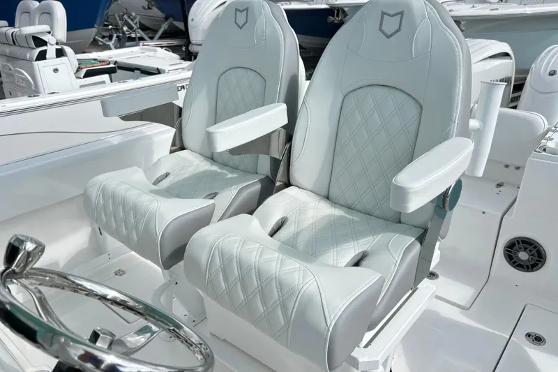 Slide: The Image of Luxurious seating on 2026 Sea Fox 268 Commander boat, featuring diamond-stitched upholstery. - 6