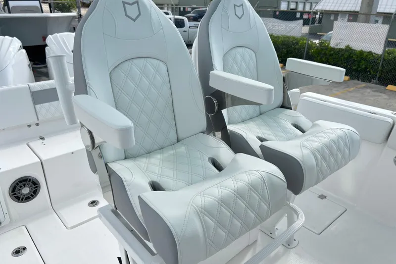 Slide: The Image of Luxurious seating on 2026 Sea Fox 268 Commander boat, featuring diamond-stitched upholstery. - 9