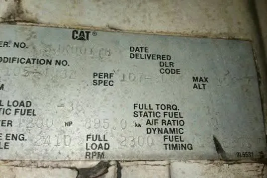 Slide: The Image of Metal identification plate on a 1994 Breaux Bay Craft 58 Sportfish boat engine. - 13
