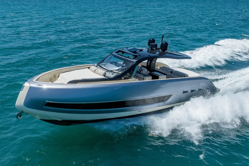Slide: The Image of 2024 Invictus 460 yacht cruising on open sea, showcasing sleek design and luxury features. - 18