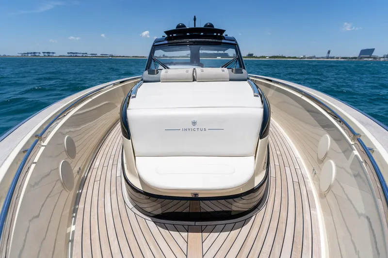 Slide: The Image of 2024 Invictus 460 yacht on open water, showcasing sleek design and luxury features. - 34