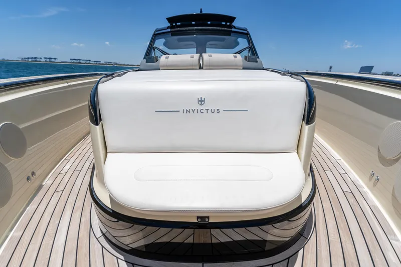 Slide: The Image of Luxury Invictus 460 yacht deck, 2024 model, featuring elegant seating and sleek design. - 35