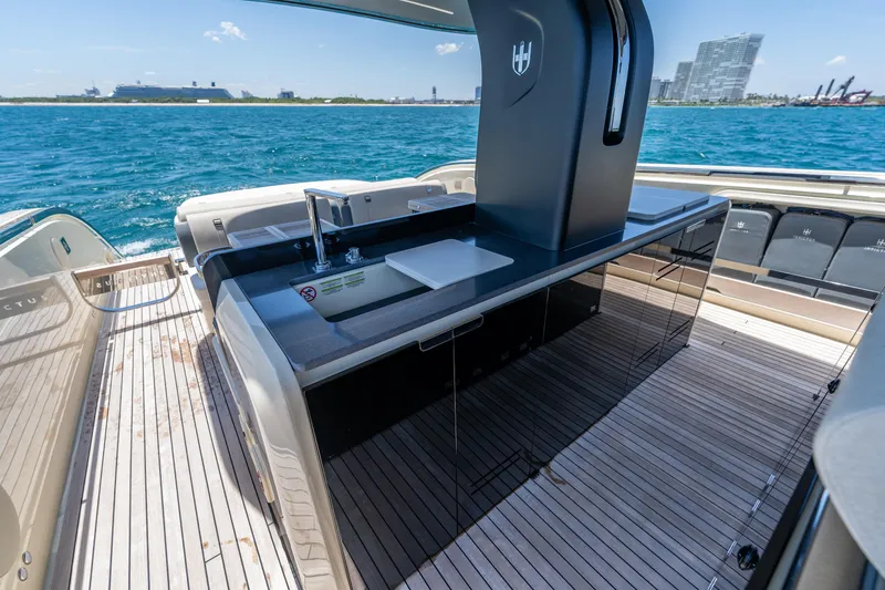 Slide: The Image of Luxury outdoor kitchen on 2024 Invictus 460 yacht with ocean view. - 40