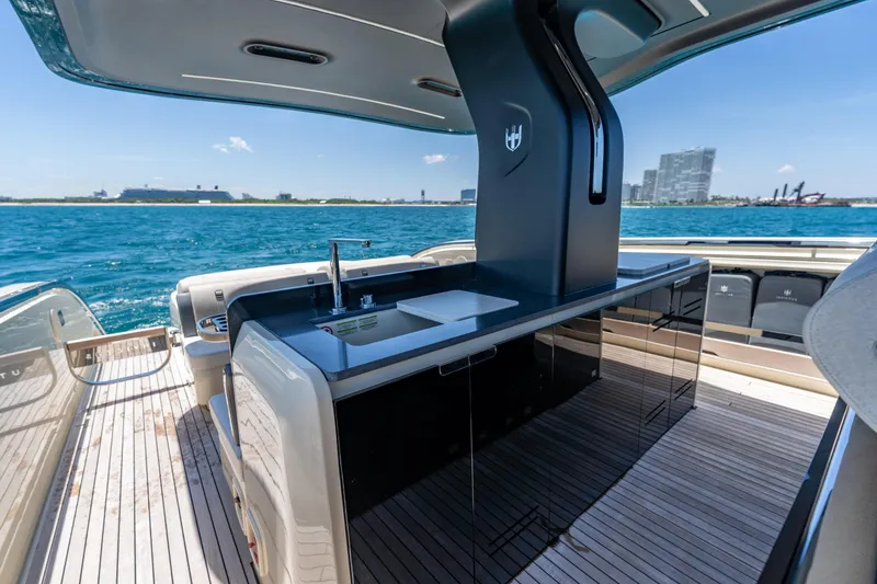 Slide: The Image of Luxury outdoor kitchen on 2024 Invictus 460 yacht with ocean view. - 41
