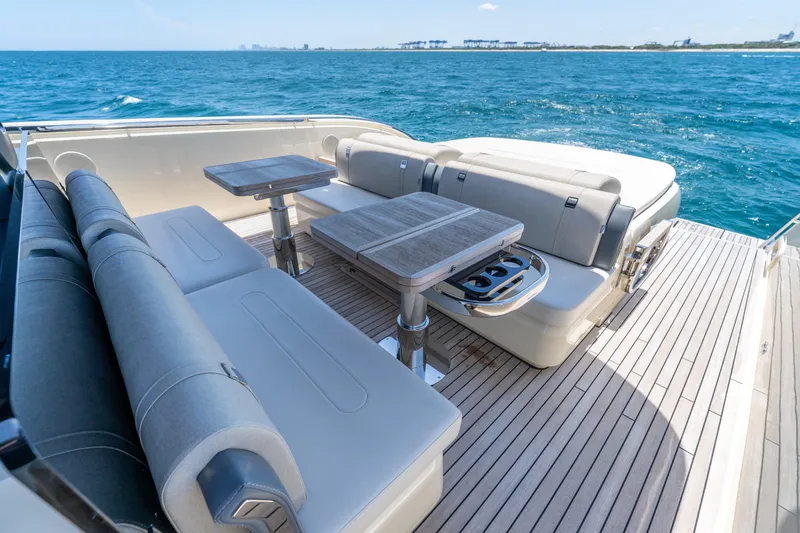 Slide: The Image of Luxurious seating area on 2024 Invictus 460 yacht with ocean view. - 48