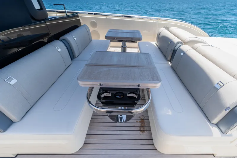Slide: The Image of Luxurious seating area on 2024 Invictus 460 yacht with ocean view. - 49