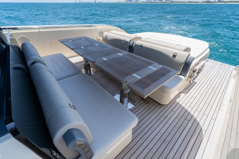 Slide: The Image of Luxurious seating area on 2024 Invictus 460 yacht with ocean view. - 51