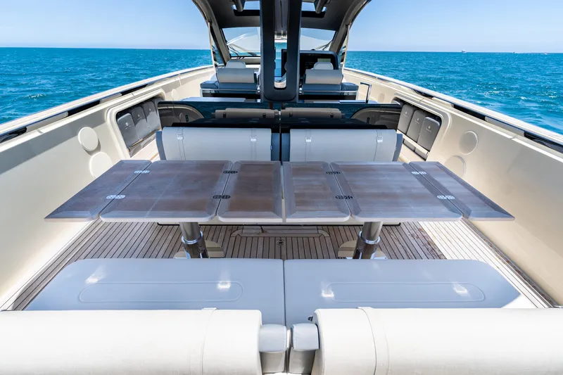 Slide: The Image of Luxurious 2024 Invictus 460 yacht interior with elegant seating and ocean view. - 52