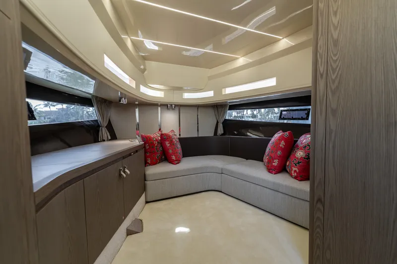 Slide: The Image of Luxurious interior of 2024 Invictus 460 yacht with elegant seating and decorative pillows. - 62
