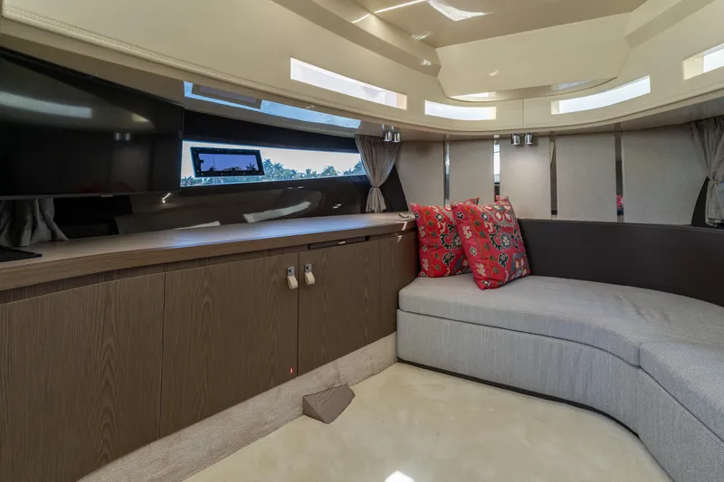 Slide: The Image of Luxurious interior of 2024 Invictus 460 yacht with modern seating and vibrant cushions. - 63