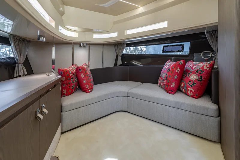 Slide: The Image of Luxurious interior of 2024 Invictus 460 yacht with elegant seating and vibrant cushions. - 67
