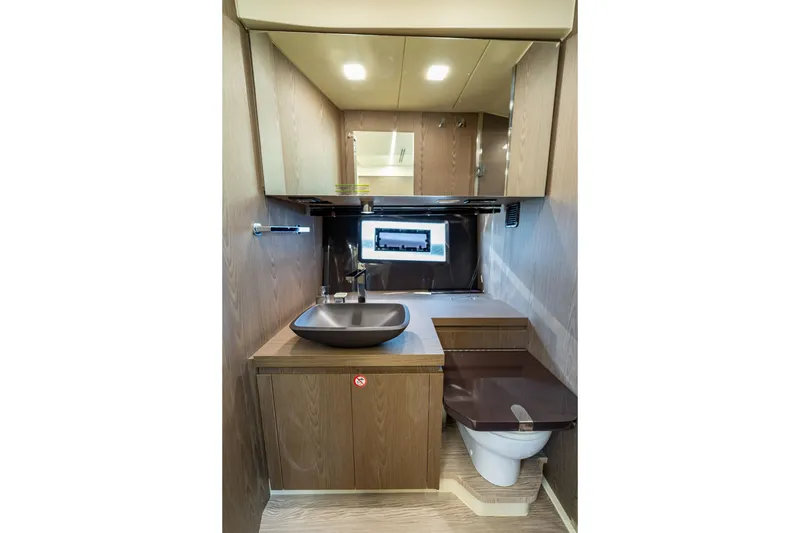 Slide: The Image of Luxurious bathroom interior of 2024 Invictus 460 yacht with modern fixtures. - 75