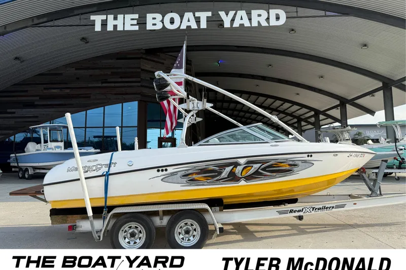 The Image of 2005 MasterCraft X10 boat on trailer at The Boat Yard dealership. - 1