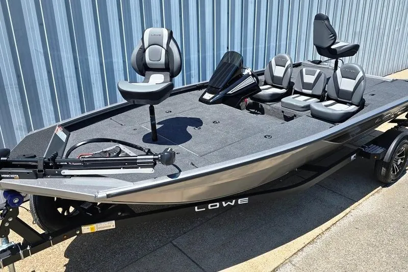 The Image of 2026 Lowe Stinger 175 fishing boat with seating, trolling motor, and sleek design. - 0