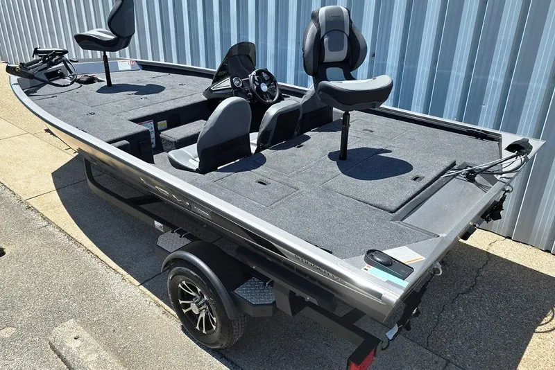 Slide: The Image of 2026 Lowe Stinger 175 fishing boat with dual swivel seats and modern design. - 11