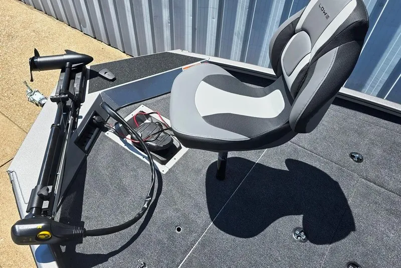 Slide: The Image of 2026 Lowe Stinger 175 boat deck with swivel seat and trolling motor. - 4
