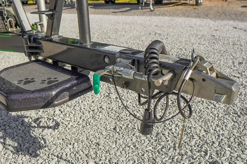 Slide: The Image of Trailer hitch of 2023 Bass Cat Puma STS on gravel surface. - 31