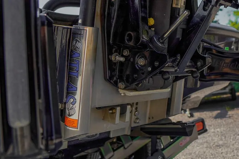 Slide: The Image of Close-up of 2023 Bass Cat Puma STS boat's Atlas hydraulic jack plate. - 5