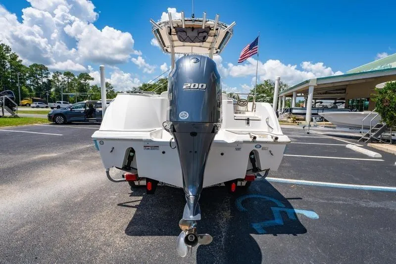 The Image of 2021 Sea Fox 228 Commander boat with 200 HP engine in parking lot. - 1