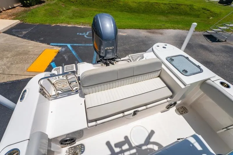 Slide: The Image of 2021 Sea Fox 228 Commander boat interior with seating and outboard motor. - 13