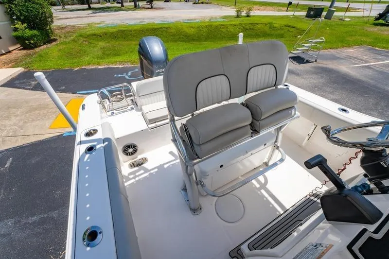 Slide: The Image of 2021 Sea Fox 228 Commander boat interior with seating and controls. - 16
