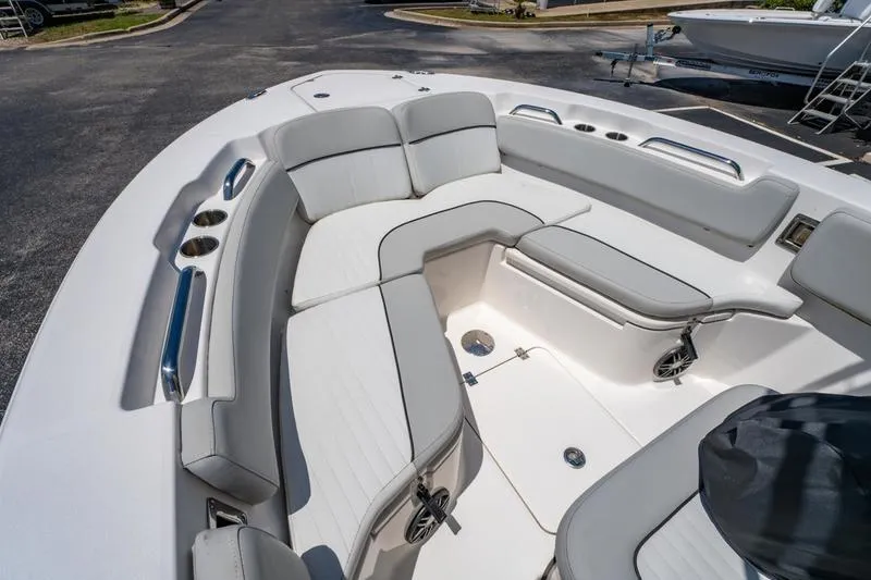 Slide: The Image of Interior view of 2021 Sea Fox 228 Commander boat with cushioned seating. - 6