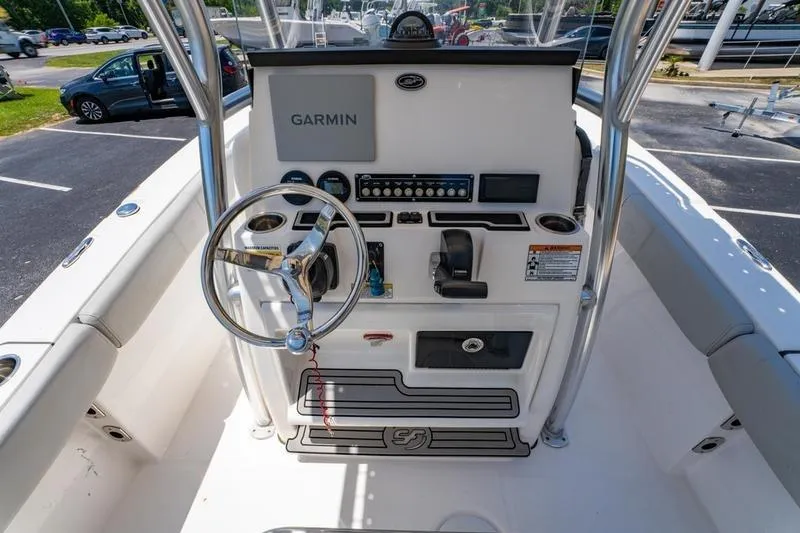 Slide: The Image of 2021 Sea Fox 228 Commander boat console with Garmin navigation system and steering wheel. - 9