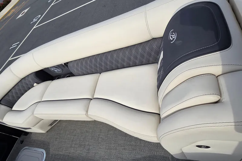 Slide: The Image of Luxurious seating on 2025 Barletta Lusso 25UCA pontoon boat, featuring elegant upholstery and design. - 11