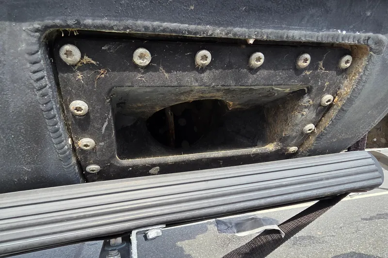 Slide: The Image of Close-up of Barletta Lusso 25UCA 2025 boat hull with visible mounting bolts. - 21