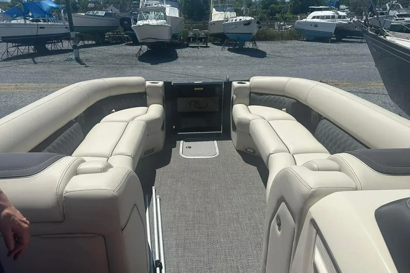 Slide: The Image of Luxurious interior of 2025 Barletta Lusso 25UCA pontoon boat with plush seating. - 23