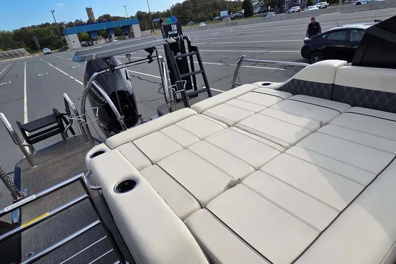 Slide: The Image of 2025 Barletta Lusso 25UCA pontoon boat with spacious seating and modern design. - 8