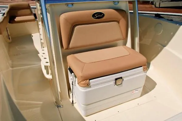 Slide: The Image of Manufacturer Provided Image: 2020 Scout 195 Sportfish boat with tan cushioned seating and integrated cooler. - 3