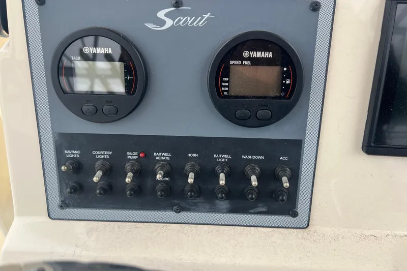Slide: The Image of Control panel of a 2020 Scout 195 Sportfish boat with Yamaha gauges. - 8