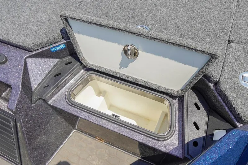 Slide: The Image of Open storage compartment on 2025 Ranger Z520 boat deck. - 17