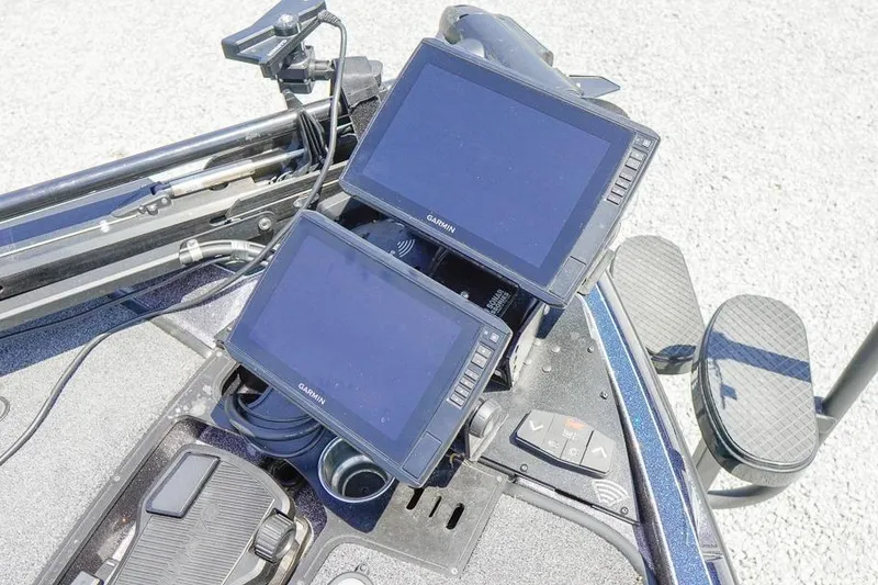 Slide: The Image of Dual Garmin displays on 2025 Ranger Z520 boat dashboard. - 23