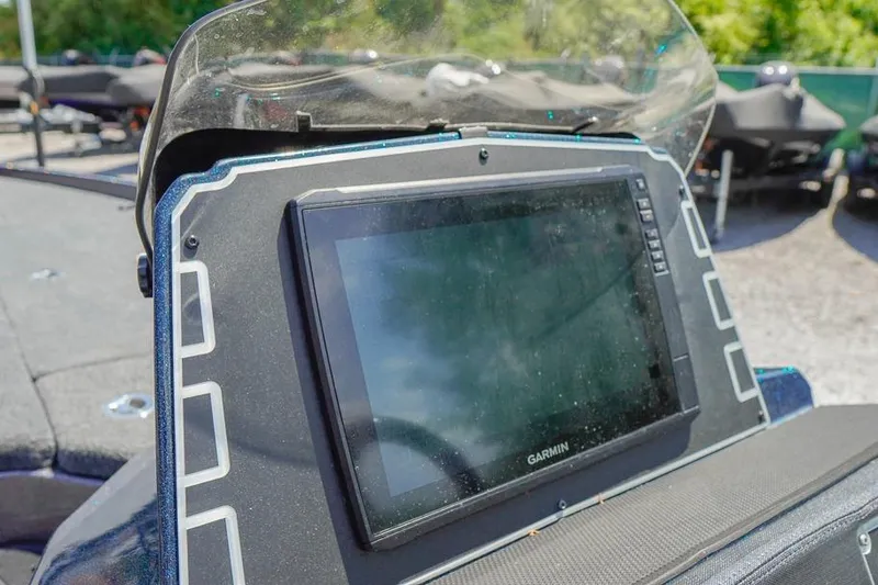 Slide: The Image of 2025 Ranger Z520 boat dashboard with Garmin display, featuring sleek design and advanced technology. - 24
