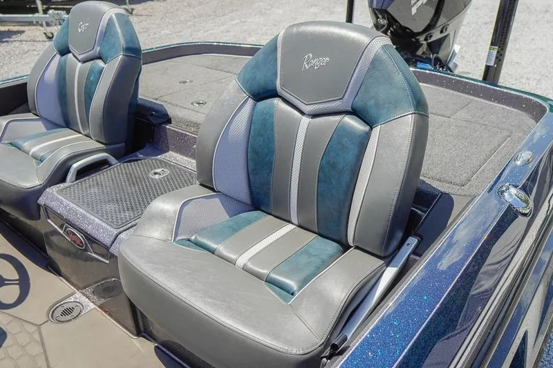 Slide: The Image of 2025 Ranger Z520 boat seats with blue and gray upholstery, showcasing premium design. - 26