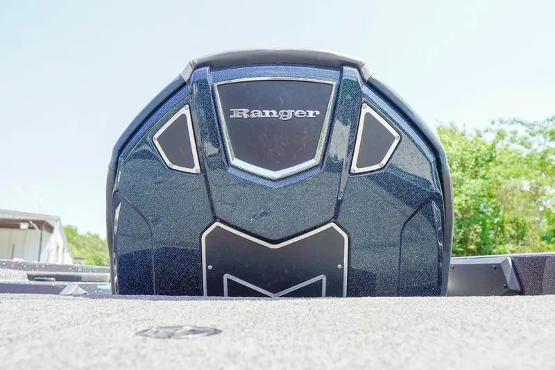 Slide: The Image of 2025 Ranger Z520 boat engine cover, sleek design with metallic finish. - 9