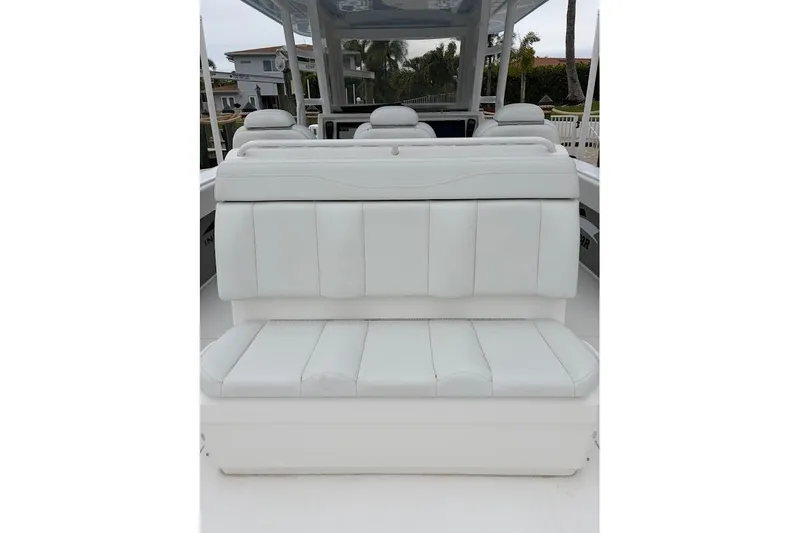 Slide: The Image of White seating on 2019 Invincible 40 Catamaran, showcasing luxurious marine upholstery. - 14