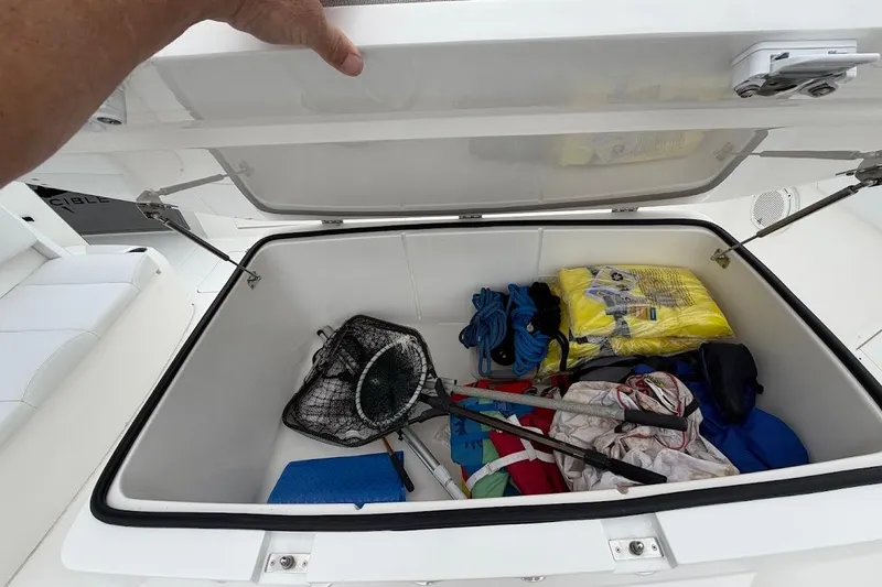 Slide: The Image of Storage compartment on 2019 Invincible 40 Catamaran with fishing gear and supplies. - 16