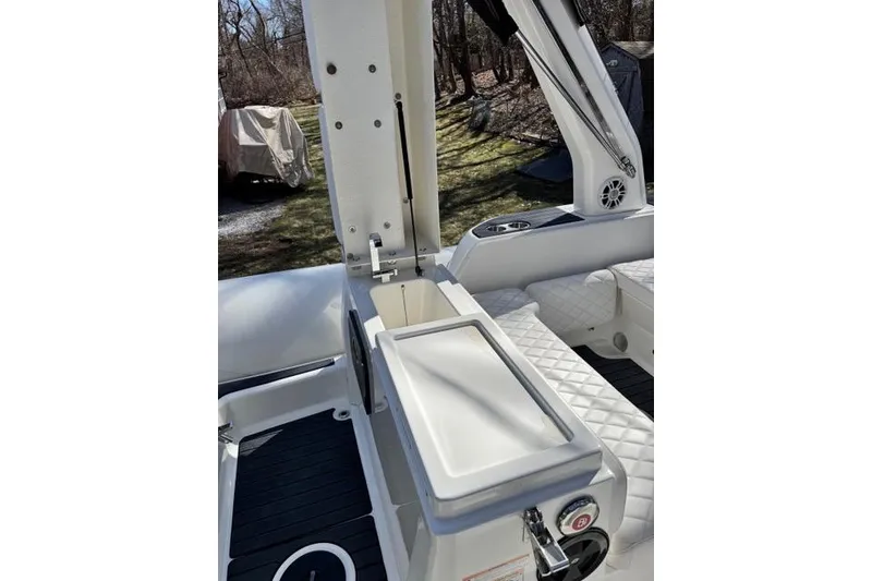 Slide: The Image of 2024 Zodiac Medline 7.5 GT boat interior with seating and storage compartment. - 12